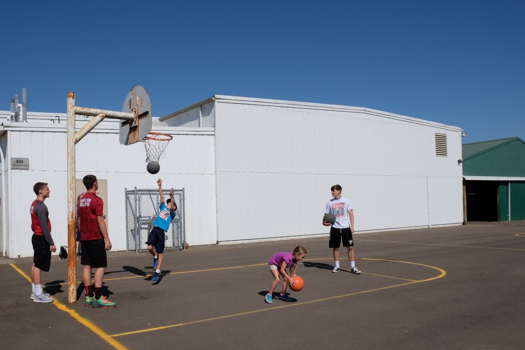 Kids playing basketball