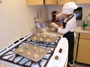 Child making cookies