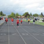 Children running track