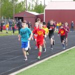 Children running track