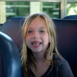 smiling girl on bus