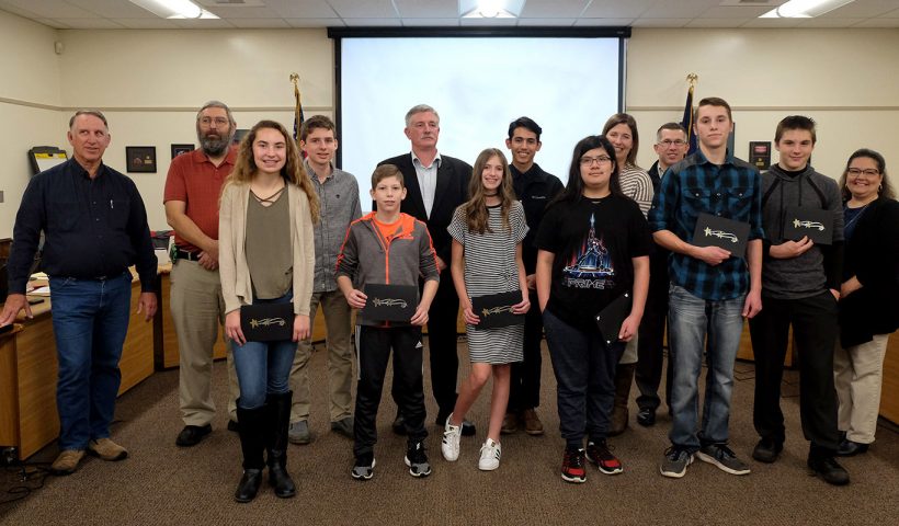 Timber Ridge All-Star students stand with School Board members