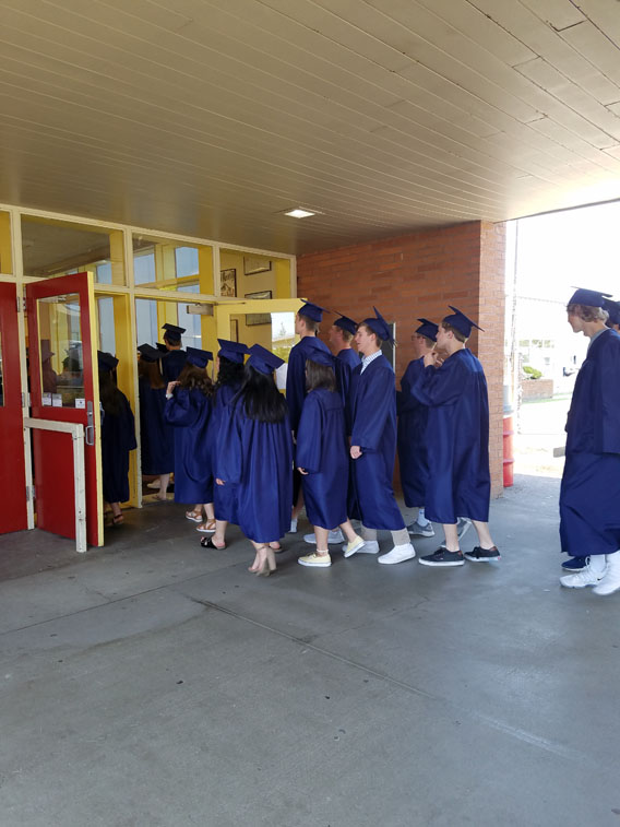 Parade of graduates at Memorial Middle School